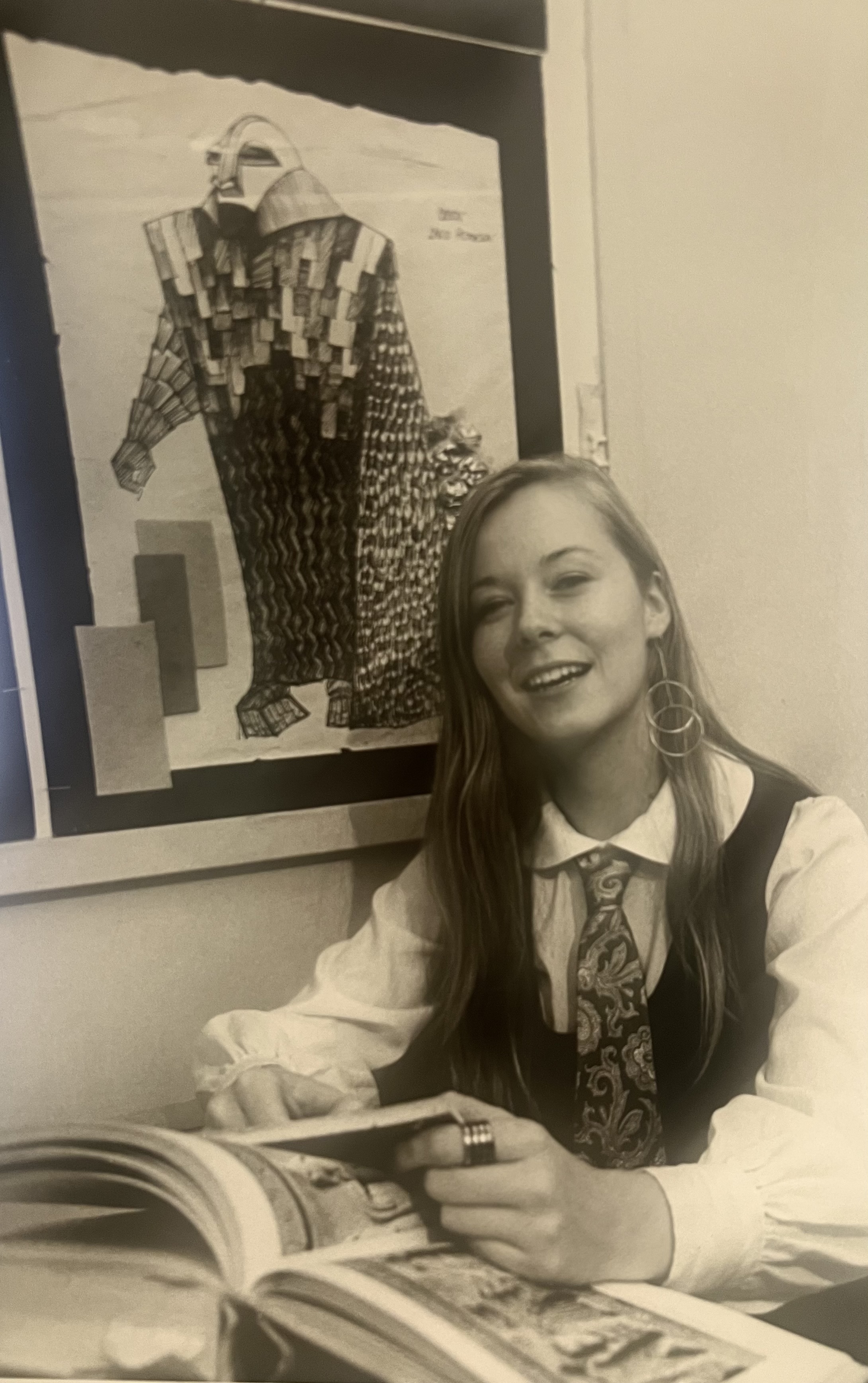 Laura Crow in graduate school at the University of Wisconsin, with a costume rendering for Oedipus Rex